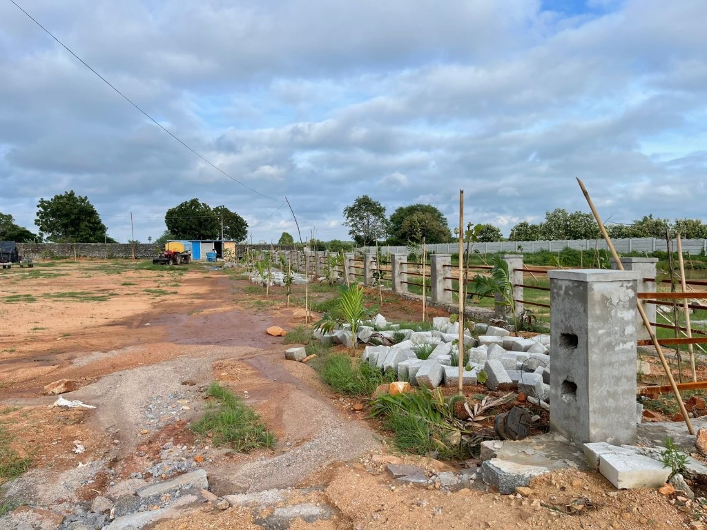Site development with plot fencing